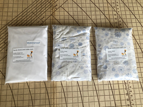 Twin Pack Fitted sheets and waterproof mattress protector to fit portacot