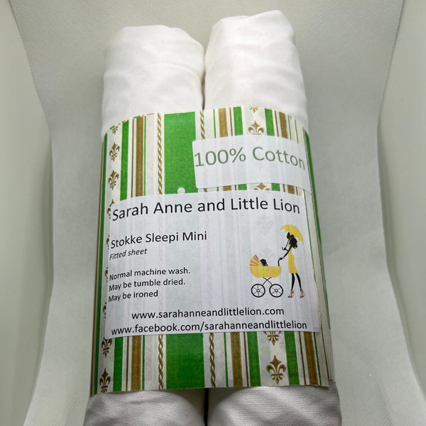 Pack of one or two white fitted sheets labeled as 100% Cotton, designed for Stokke Sleepi Mini or cot, displayed in a wrapped condition with branding visible.