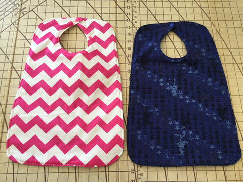 Super bibs! Wider and longer with an adustable neck opening for the perfect fit