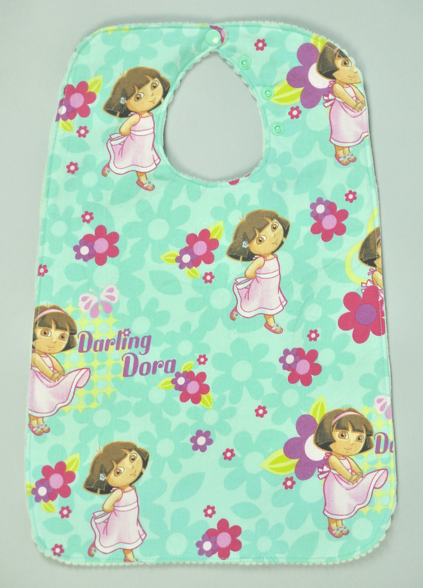 Super bibs! Wider and longer with an adustable neck opening for the perfect fit - Dora the Explorer