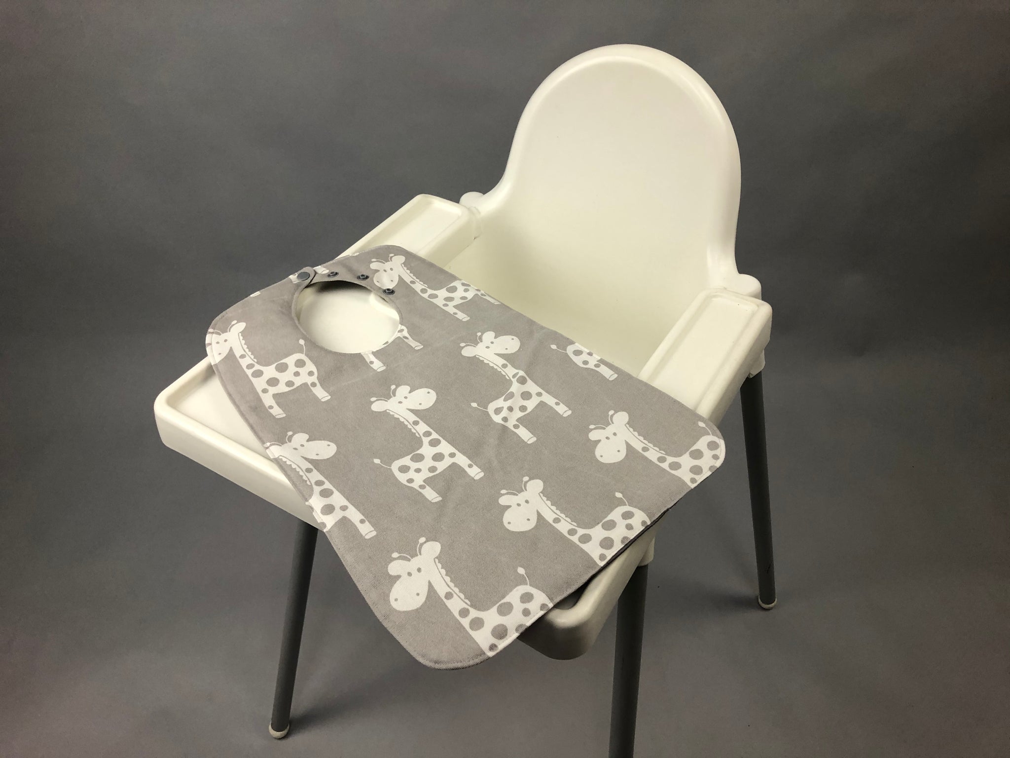 Super bibs! Wider and longer with an adustable neck opening for the perfect fit - Giraffe